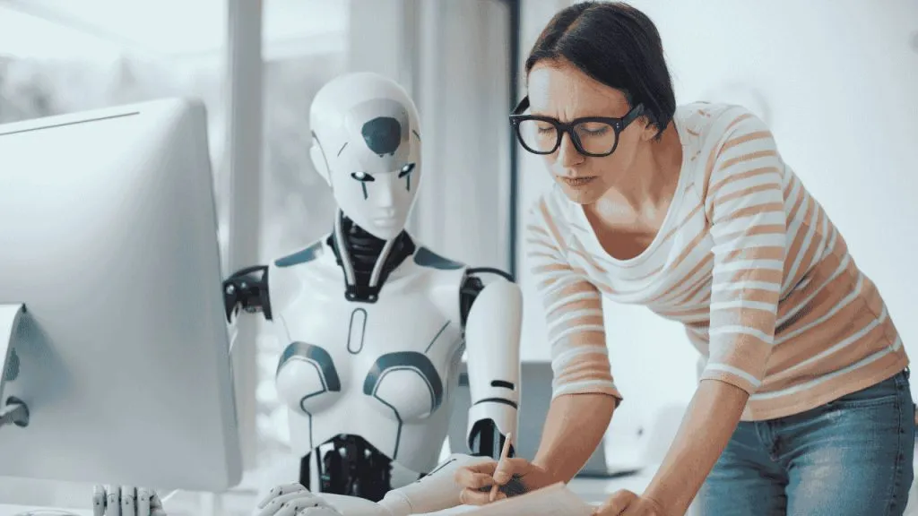 Person typing a question into an AI chat interface on a laptop